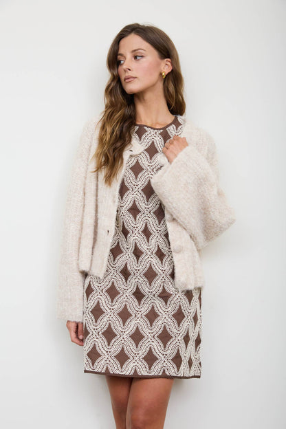 TEXTURED GEOMETRIC SLEEVELESS MINI DRESS